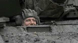 Ukraine troops bristle at rumours of chief's possible firing