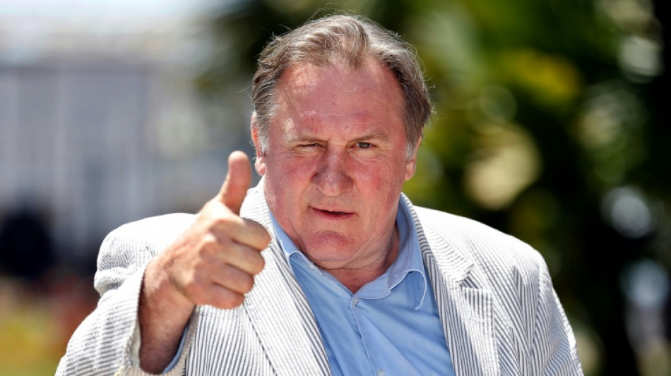 Macron says French film star Depardieu target of a 'manhunt'