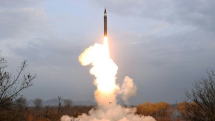 North Korea says it test-fired new solid-fuel hypersonic missile