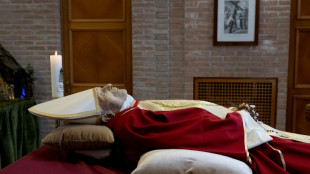 Catholics pay tribute to ex-pope Benedict at lying-in-state