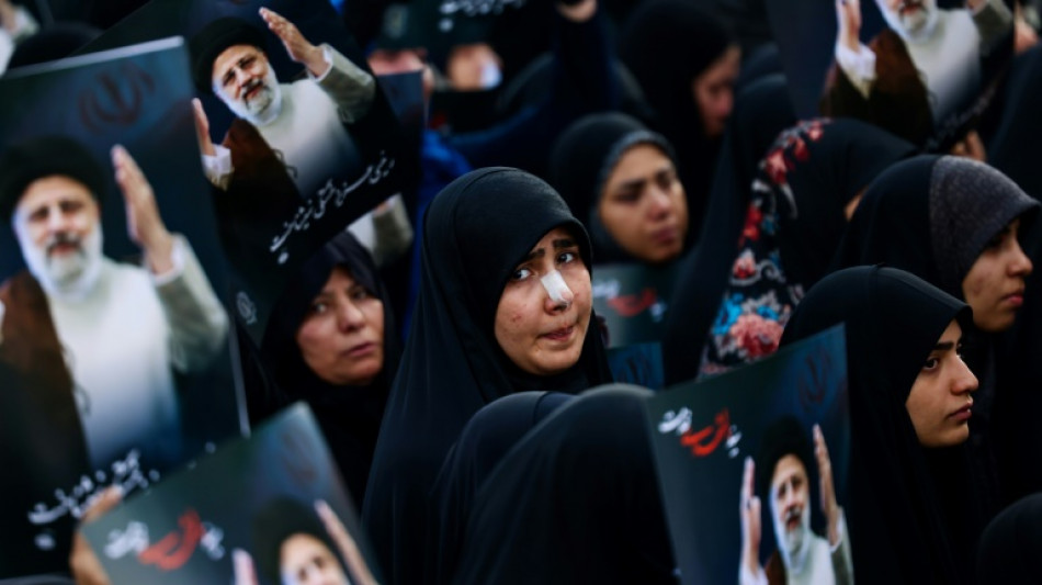 Tens of thousands gather for Raisi funeral procession in Tehran 