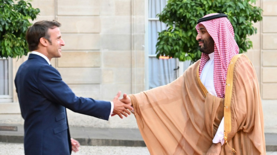 Macron defies anger to welcome Saudi strongman