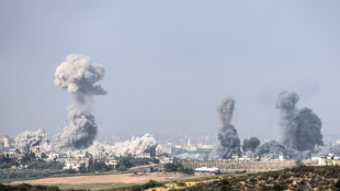 Gaza's embattled main hospital buries patients in mass grave