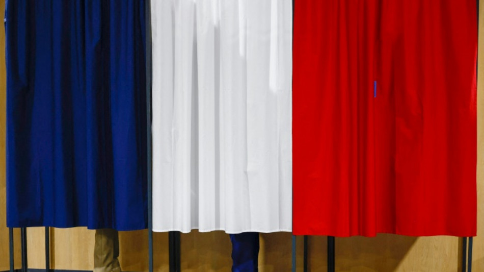 Millions of French vote in snap polls as far right eyes power