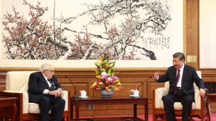 China hails 'old friend' Kissinger, architect of rapprochement