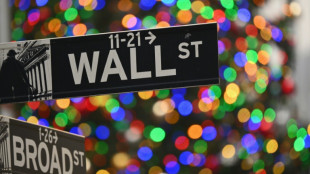 US stocks in record territory as bond yields ease