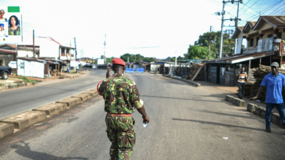 Curfew partially lifted in SLeone capital after clashes killed 13 soldiers