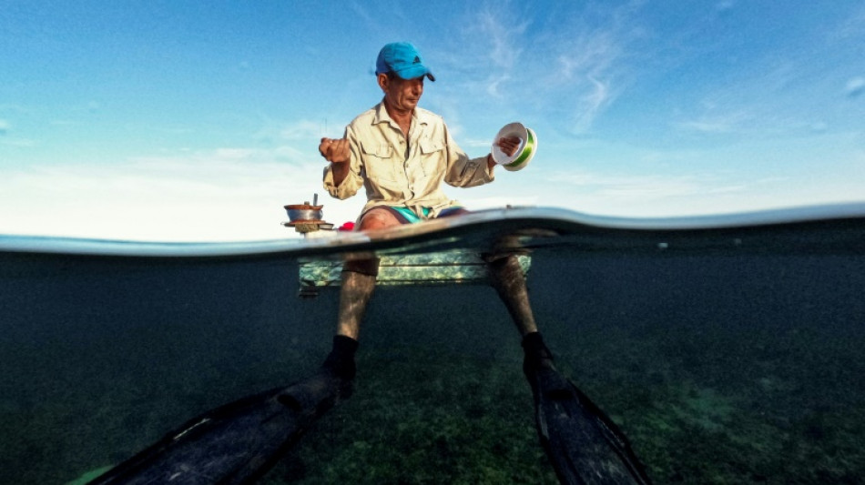 With no money or fuel, Cuban fishermen improvise on floating rafts