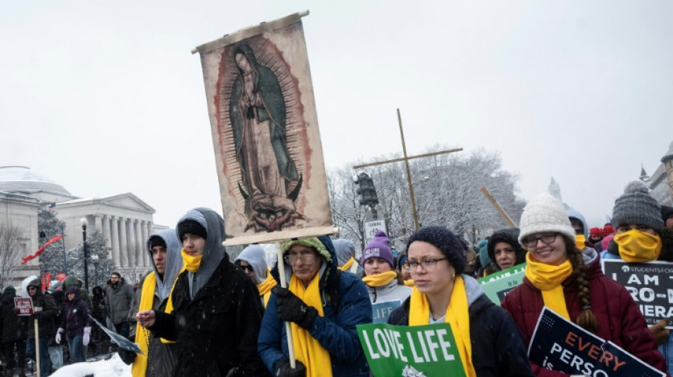 Anti-abortion activists march on snowy Washington