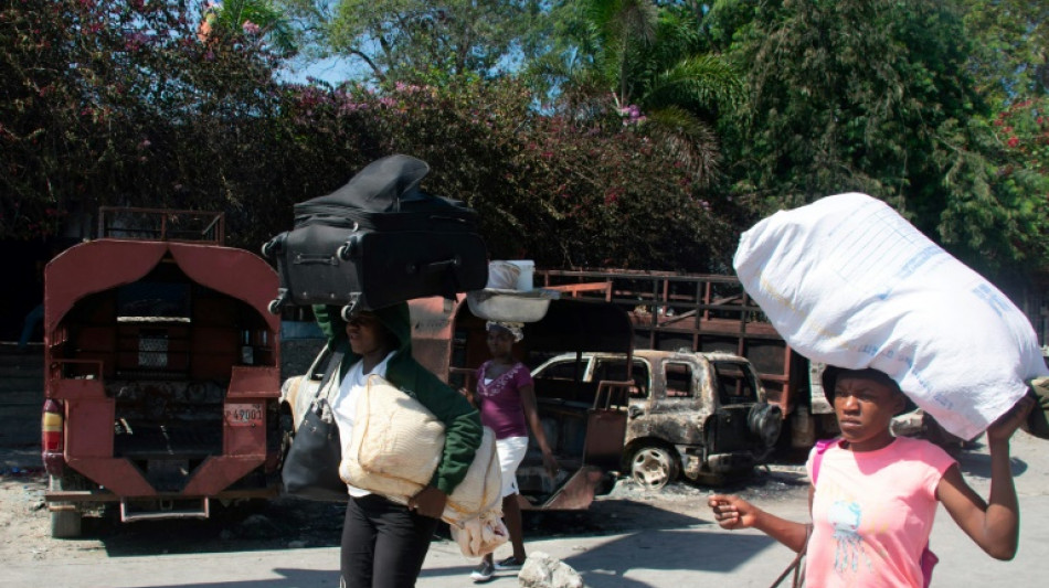 Gunfire booms in Haiti as politicians seek to form interim gov't