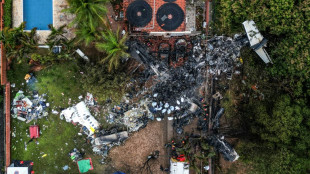 Workers recovering bodies from Brazil plane crash, inquiry underway